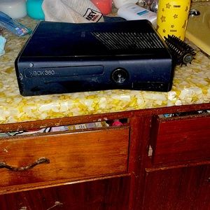 I’m selling a Xbox 360 the brand is from Microsoft height of 3.1 width 12”2 blak